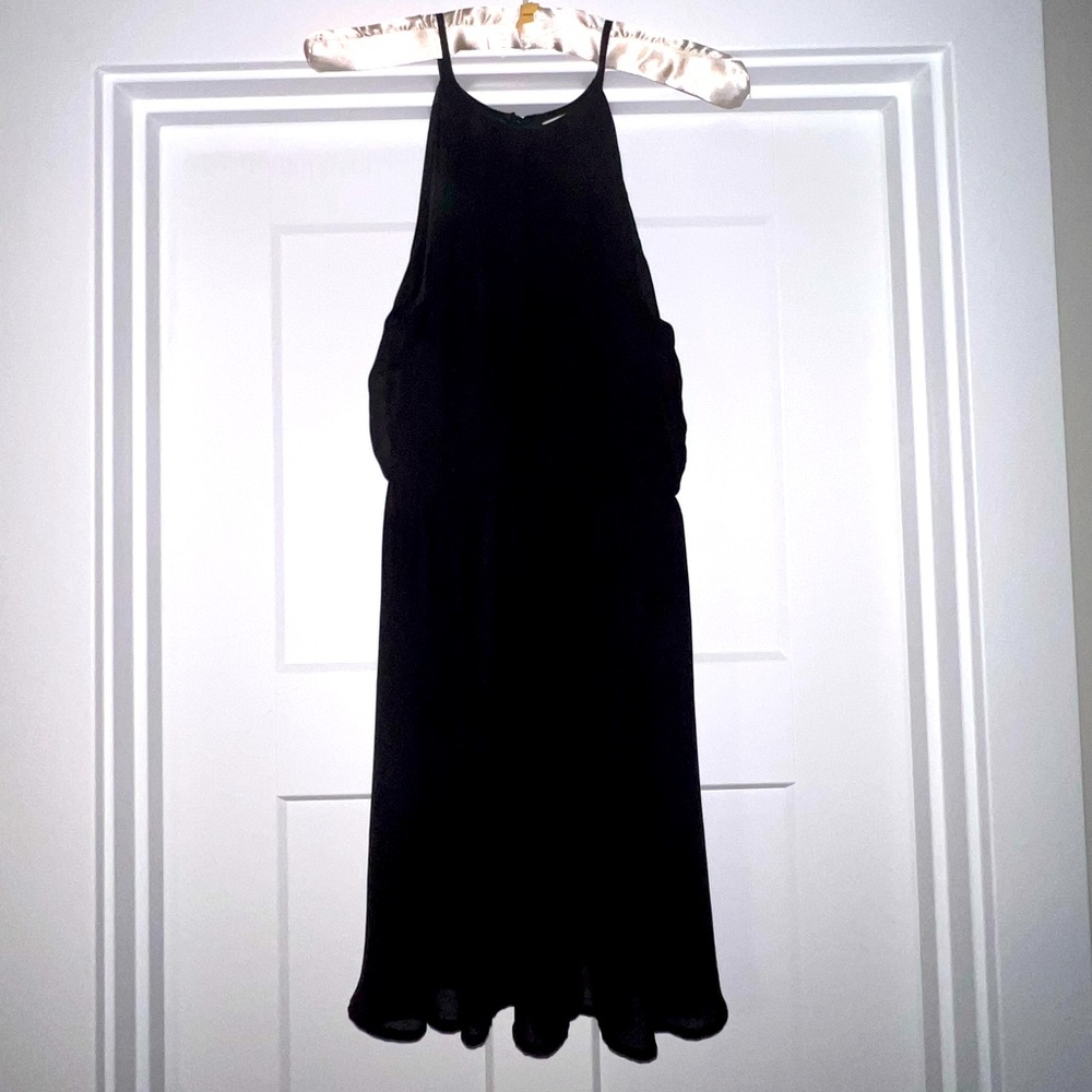 Like new. Semi-formal black dress. Size Small